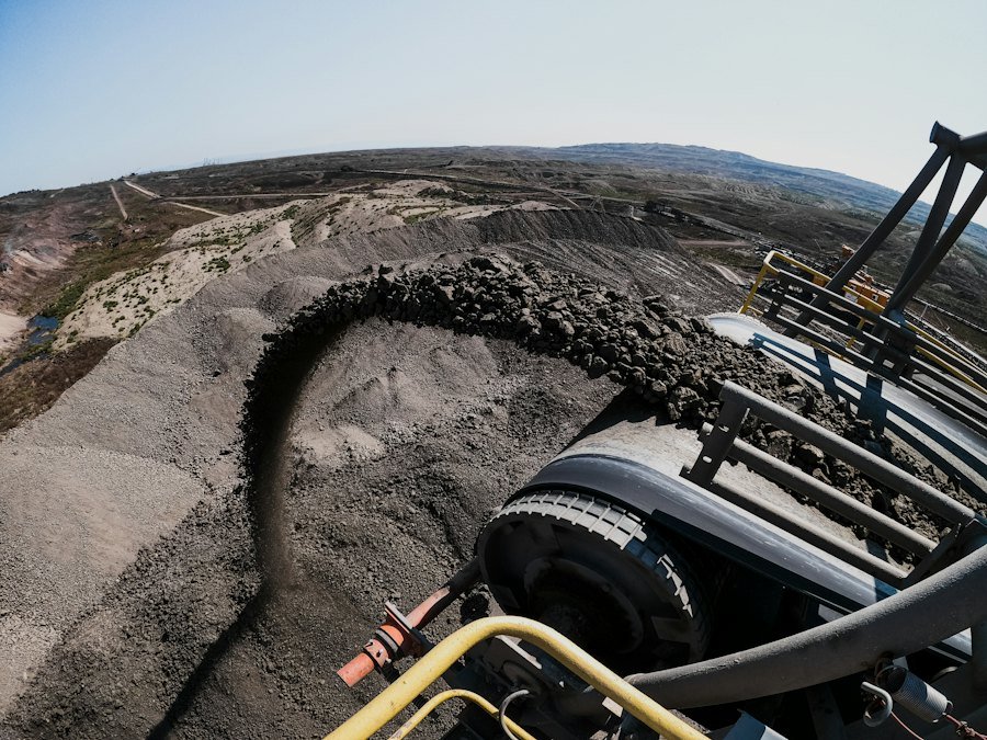 Conveyor carrying coal at a bulk handling site