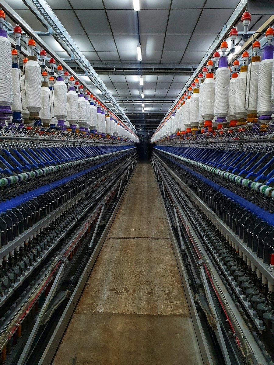 Rows of spinning machines in a textile mill